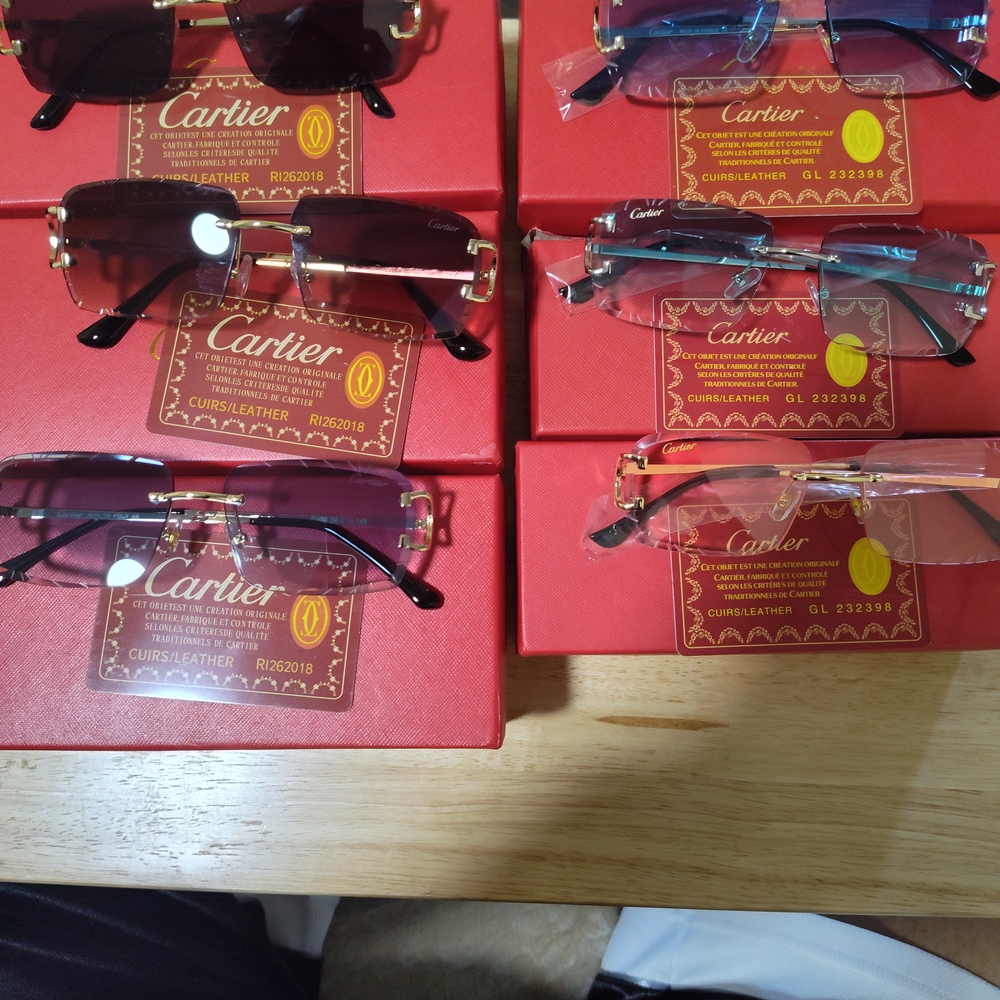 Cartier Sunglasses in Gold and Black